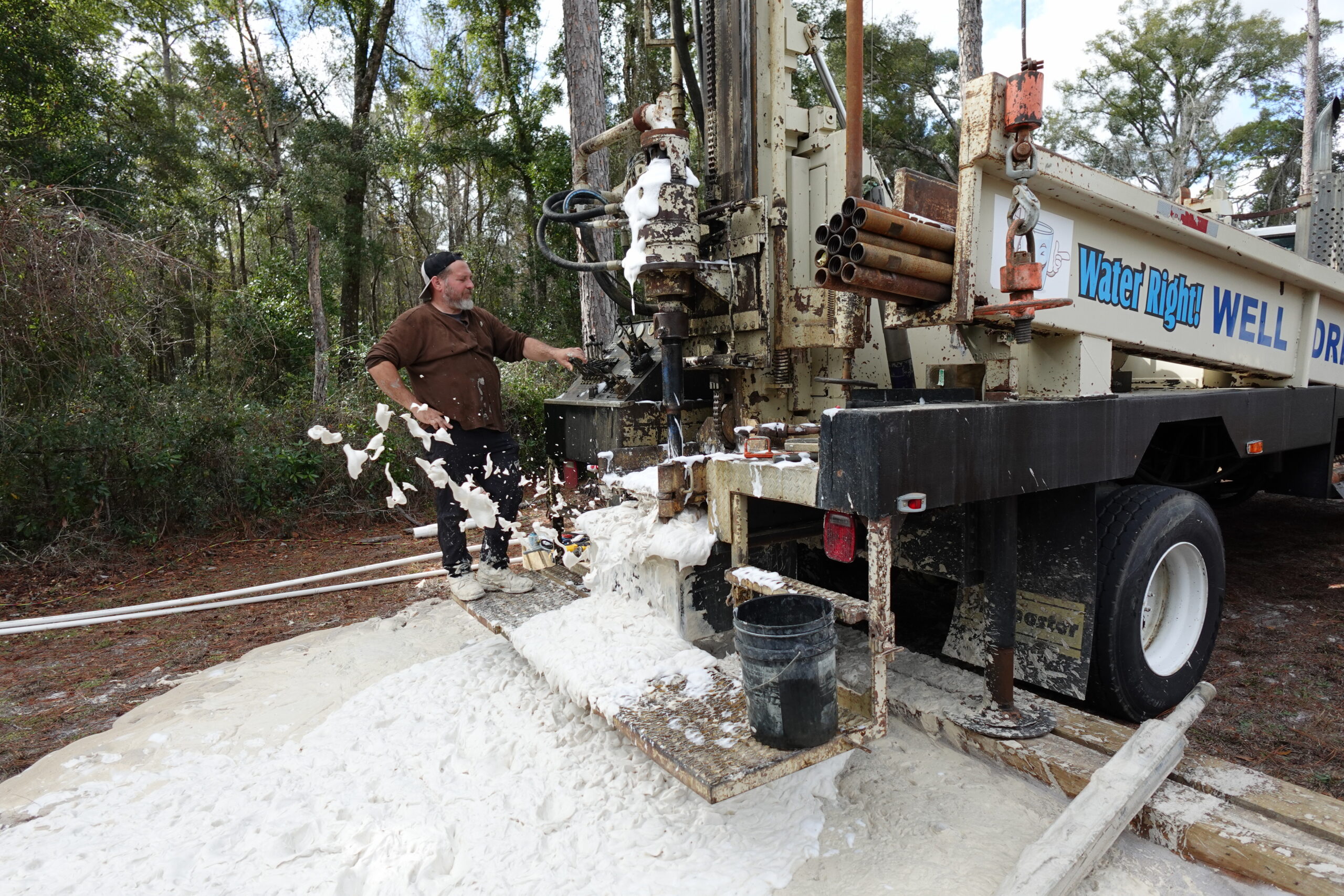 Jeff Mamuzich, owner and operator of Water Right, drilling a well on his rig in North Florida